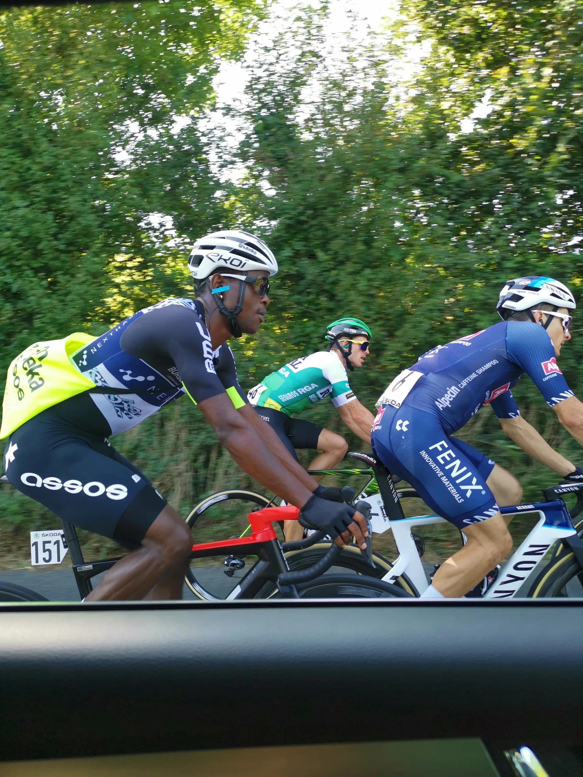 Cyclists riding together on a Northumberland road